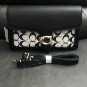 Chic Black and White Clutch with Gold Accents